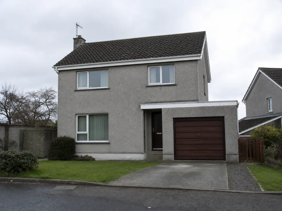 Plain house facade renovated with new cladding and windows
