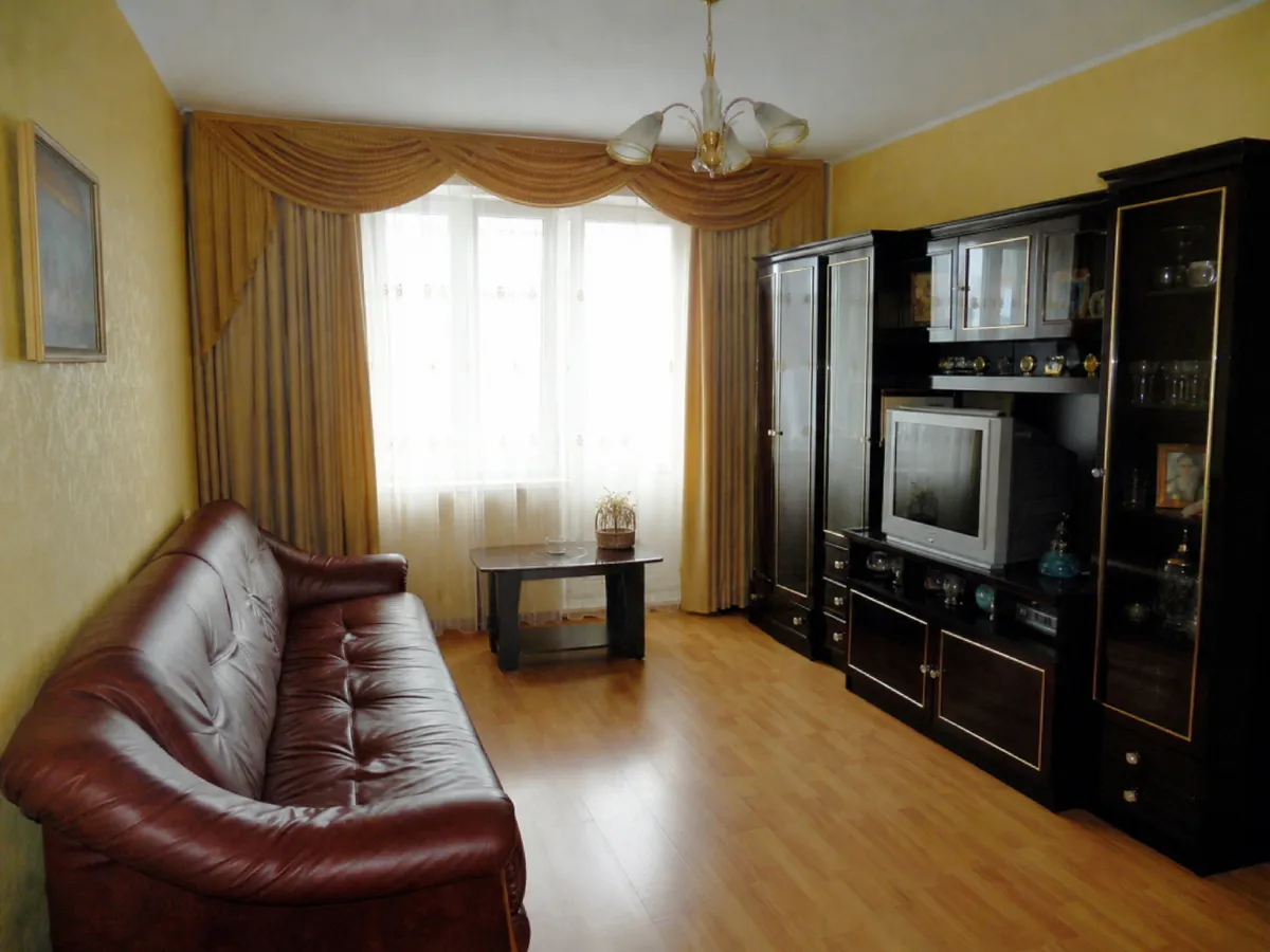 Dated living room restyled with new furniture and colors